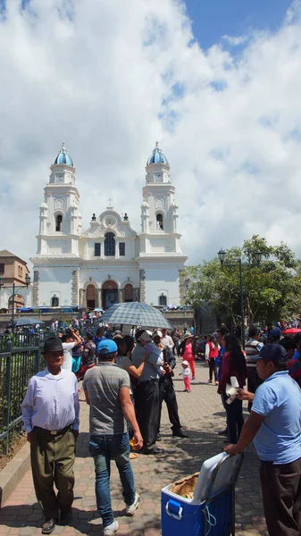 El Quinche, Pichincha / Ecuador - November 13 2016: People walking in front of Sanctuary of the Virgin of El Quinche. On July 8, Pope Francisco I visited this church as part of his agenda in Ecuador