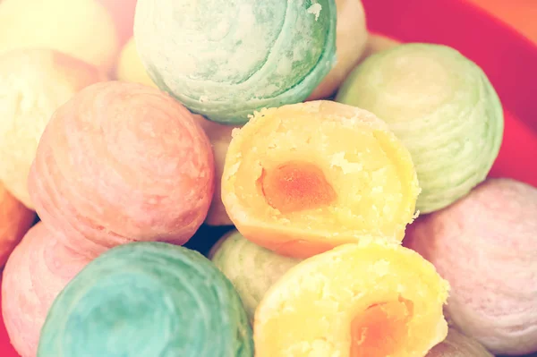 Chinese dessert called \'Pia\',ancient dessert Made from flour to Baking heat Mashed golden beans stuffed with salted egg yolk,Chinese pastry, Traditional delicious cake in asia,pastel color