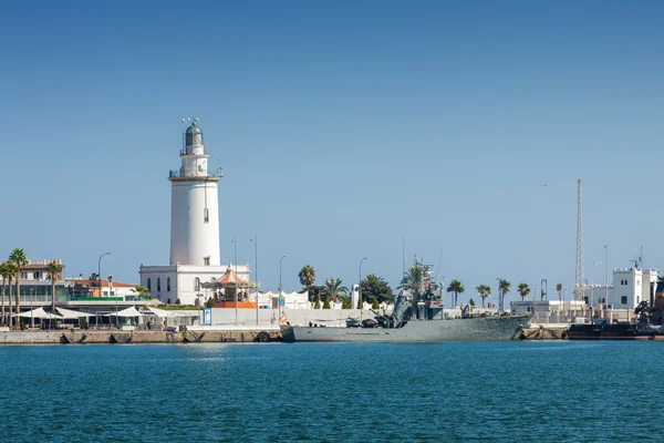 Sea lighthouse at marine of port of Malaga, Andalusia province, Spain.