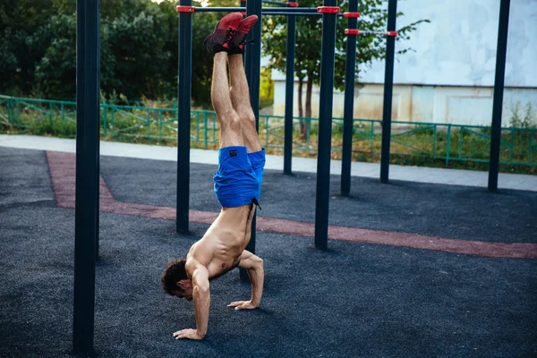 Sportsman training at crossfit ground. concept of sport