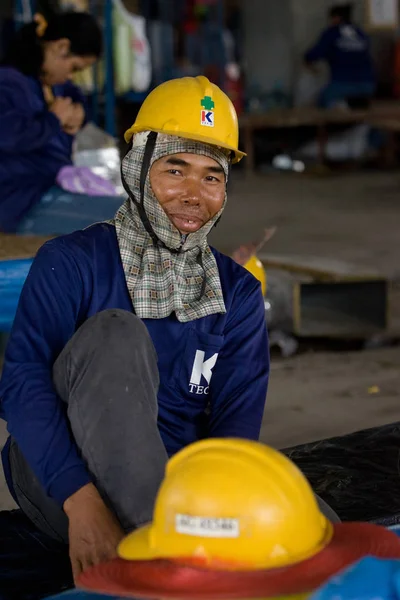 Bangkok, Thailand, Workers have a rest during lunch time