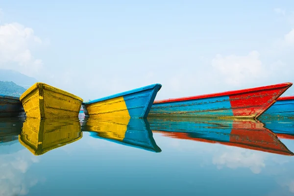 Colorful boats with they reflection
