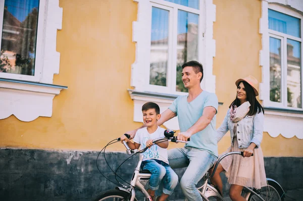 Family riding bicycle