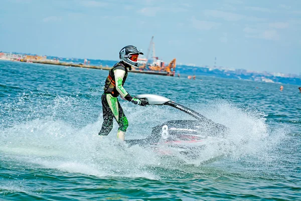 Odessa, Ukraine - June, 2012: Young Man on Jet Ski. Professional