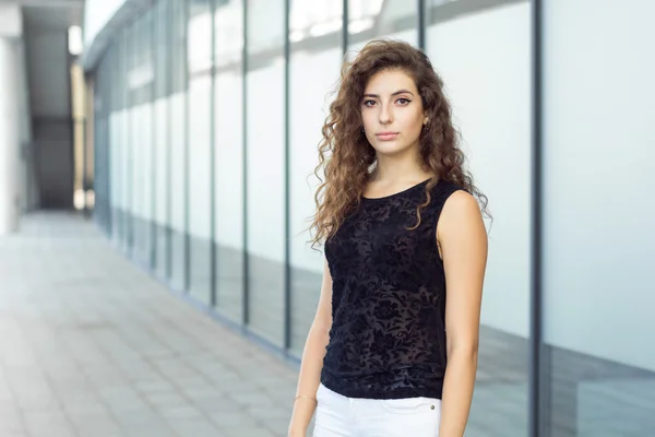 Sad girl standing on the street