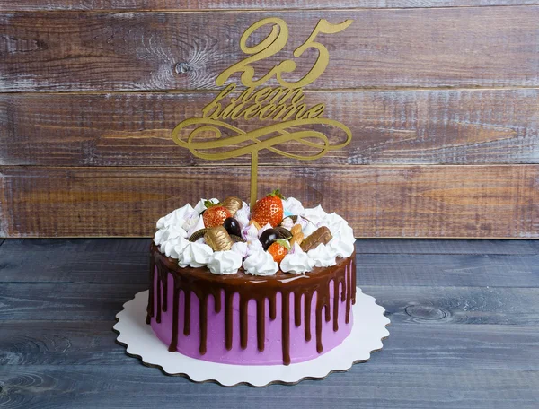 Wedding anniversary cake with merengue and chocolate decoration