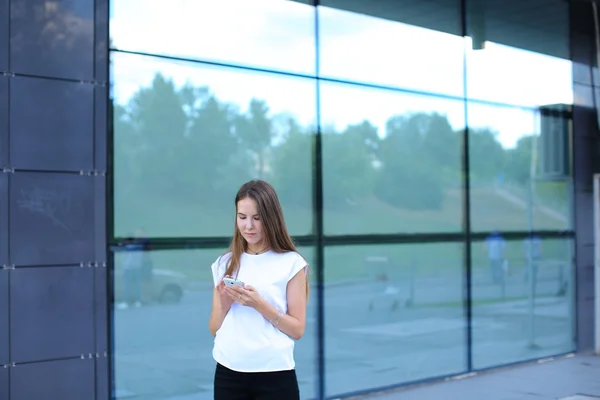 Business woman work near center speaks on phone