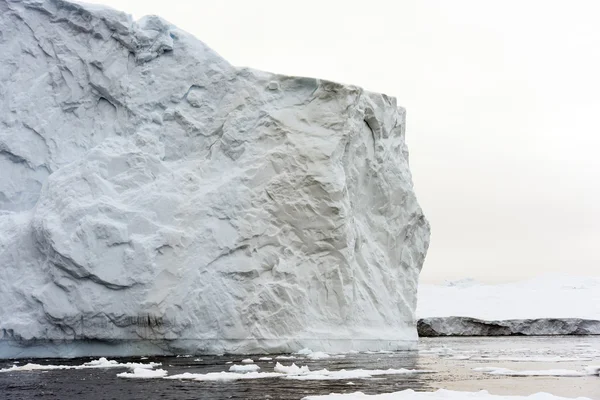 Huge icebergs are on the arctic ocean in Greenland