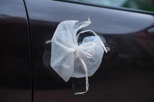 Wedding ribbon on car
