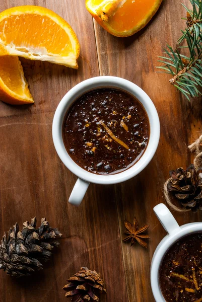 Hot chocolate with spices, orange and orange zest