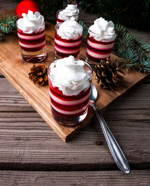 Christmas dessert, striped jelly in the style of Christmas candy