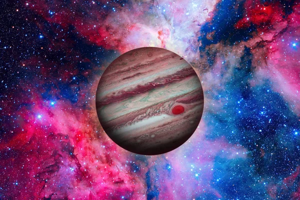 Planet Jupiter. Nebula on the background.