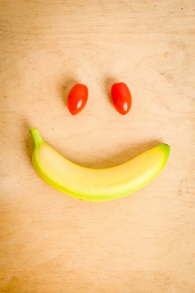 Smile with banana and tomato