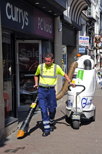 Street cleaner along Eastgate Street, Chester.