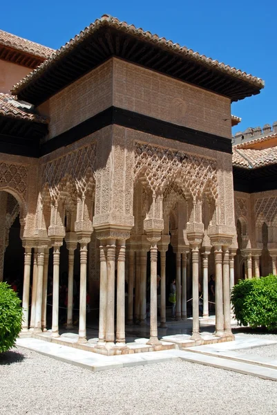 Marble arches forming the arcades surrounding the court of the Lions (Patio de los leones), Palace of Alhambra, Granada.