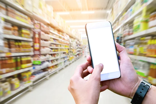 Human using Mobile Phone with blank screen on Department store b