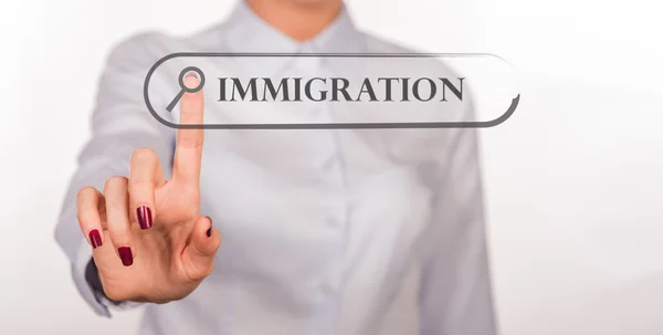 IMMIGRATION written in search bar on virtual screen