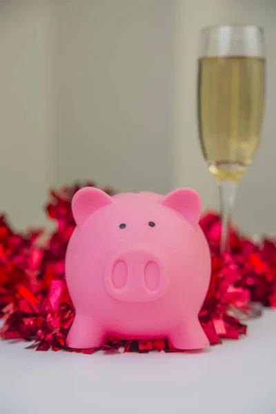 Piggy bank with Christmas decorations . piggy bank with Christmas decoration background, image for time to start saving or solution to save money for Christmas celebration holiday vacation concept.