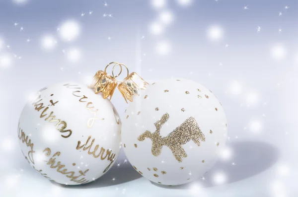 Christmas background, decoration. Christmas balls on a white background. Soft focus. Sparkles and bubbles. Abstract background. Modern.