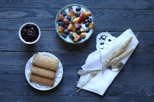 Healthy Breakfast with blueberries and banana yogurt