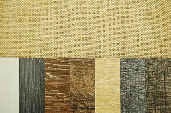 Wood texture floor Samples of laminate and vinyl floor tile on w