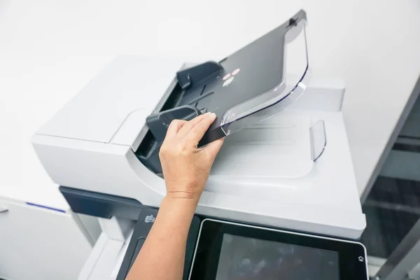 Open the automatic document feeder of the printer