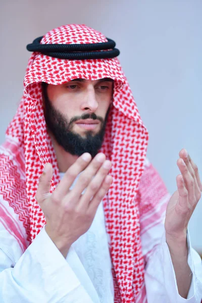 Muslim Arabic man praying