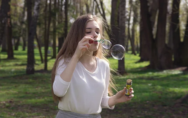 Girl with soup bubbles — Stock fotografie