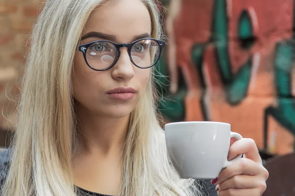 Young woman in glasses — Stock Photo, Image