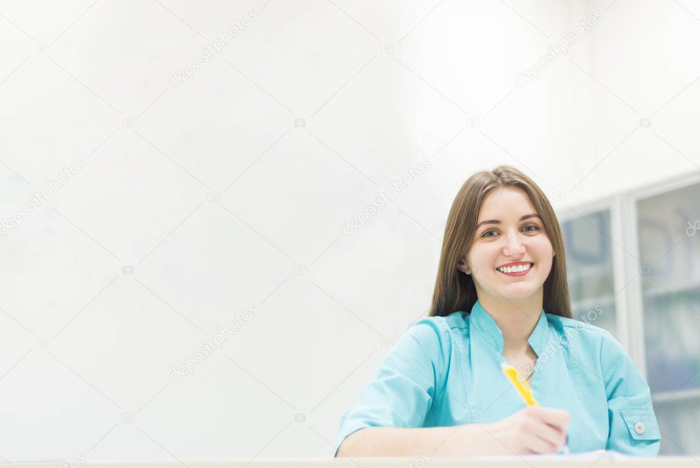 Woman behind the reception desk