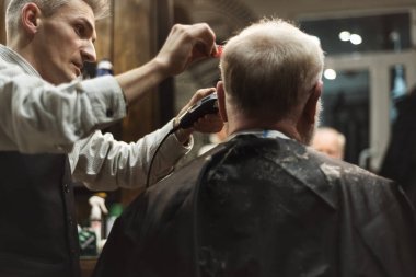 Man haircut at the barbershop clipart