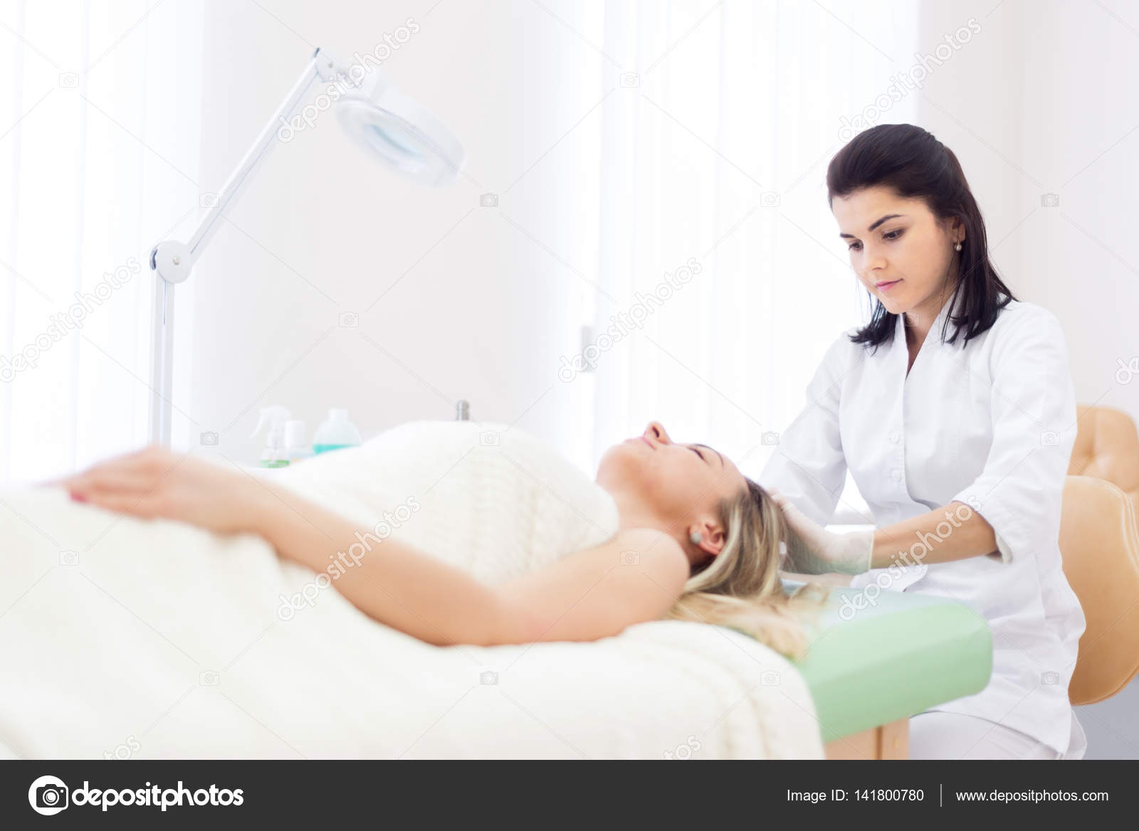 Liquid nitrogen cryotherapy procedure Stock Photo by ©victorvice 141800780