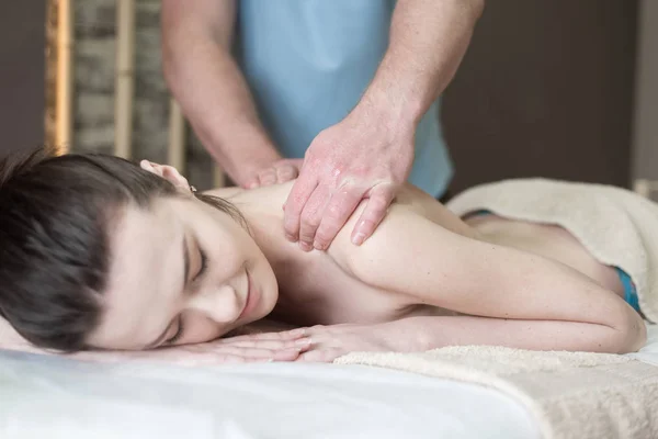 Body care. Spa body massage treatment. Woman having massage Stock Photo