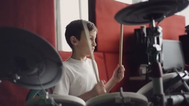 Little boy playing electronic drums — Stock Video