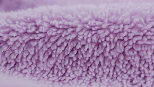 Terry lilac colored cloth towel texture as a background — Stock Video