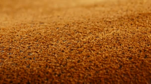 Old aged suede leather background. Coarse texture, gradient yellow brown beige, vivid colors. — Stock Video