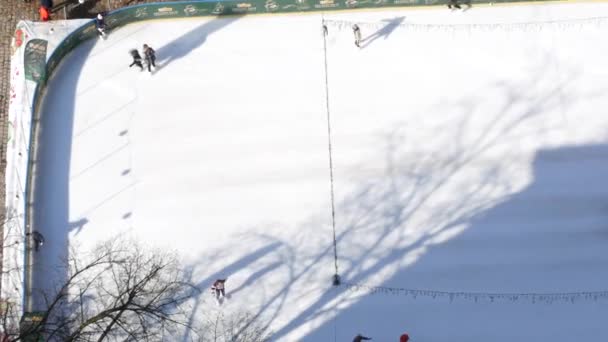 Ukraine, lviv - may 16: Aerial view of ice skating people outdoor, ice rink — Stock Video