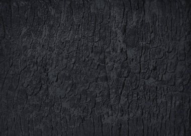 Arka planlar için doğal siyah aktifleştirilmiş kömür dokusu. Üst görünüm.