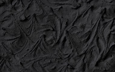 Doğal doku sıvısı kozmetik aktif kömür veya yüz maskesi ve vücut için volkanik kil. Hemşirelik modası kara tahta arka planı.