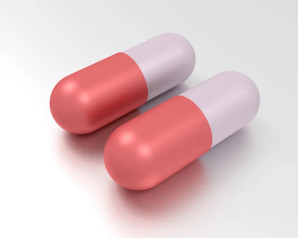 Dois comprimidos para cápsulas. Conceito de medicina — Fotografia de Stock