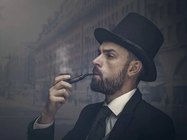Englishman detective smoking pipe — Stock Photo, Image