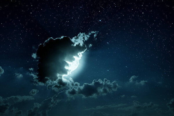 Backgrounds night sky with stars and moon and clouds. Elements of this image furnished by NASA