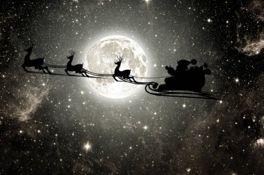 bir uçan goth silüeti Noel Baba arka plan o karşı