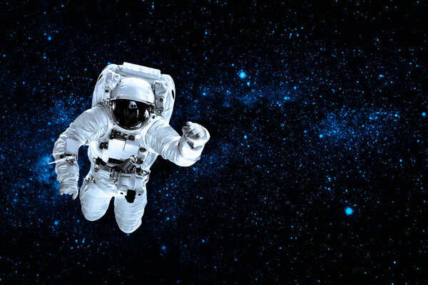 astronaut flies over the earth in space. Elements of this image furnished by NASA