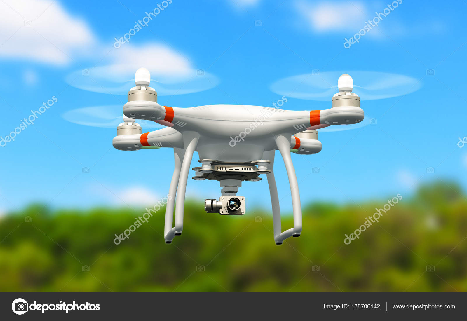 Quadcopter drone with 4K video camera flying in the air Stock