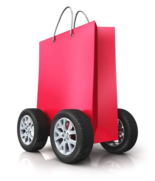 Bolsa de compras de papel rojo con ruedas de coche —  Fotos de Stock