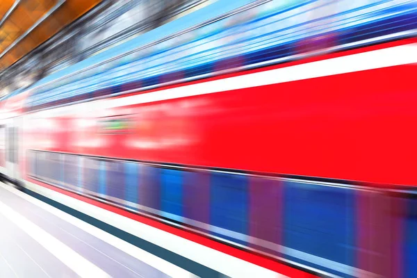 High speed train at railway station platform — Stock Photo, Image