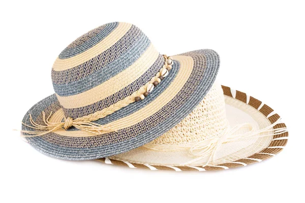 Літні капелюхи на білому — стокове фото