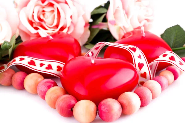 Red heart candles, necklace and roses — Stock Photo, Image