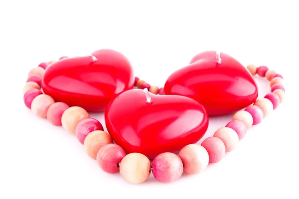 Rote Herzkerzen und Halskette — Stockfoto